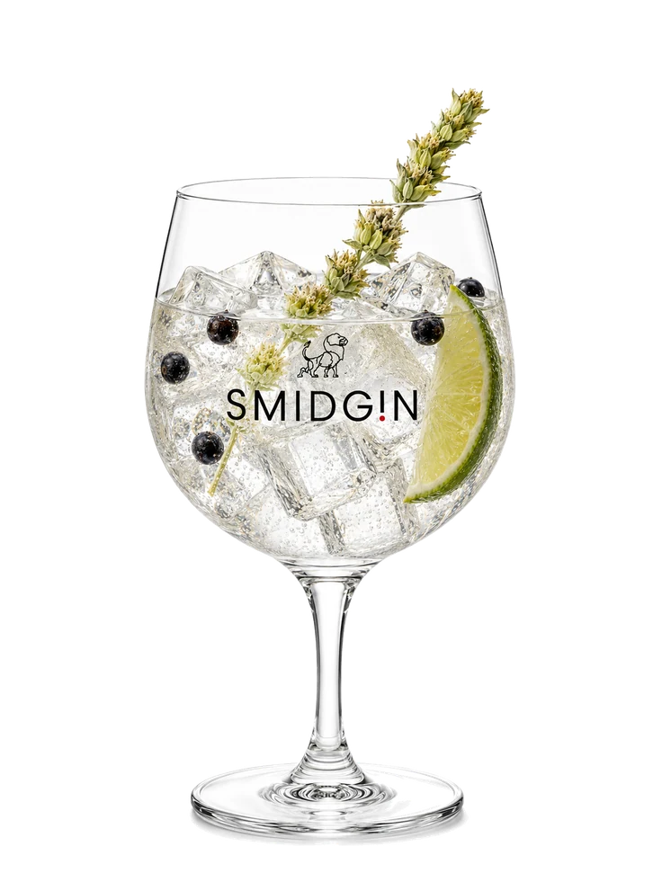 S and T, a gin and tonic in a branded Smidgin copa glass with ice, a lemon wheel and a sprig of rosemary